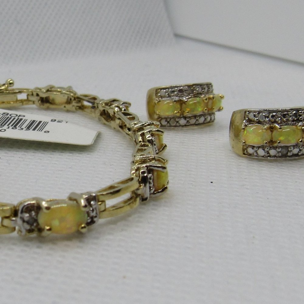 24k gold over sterling w/ diamond accents bracelet and earring w/opal like stone